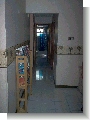 Hallway to boy's rooms, garage, laundry and restroom