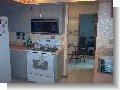 Kitchen, looking at dinning and guest bedroom